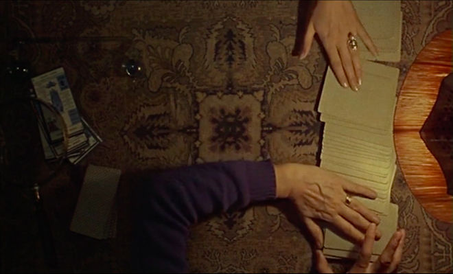 IMAGE: Still - 01 Two hands dealing cards