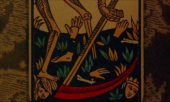 IMAGE: Still - Close up death card scythe