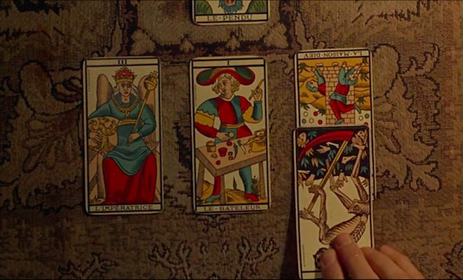 IMAGE: Still - 28 Death Card being laid down